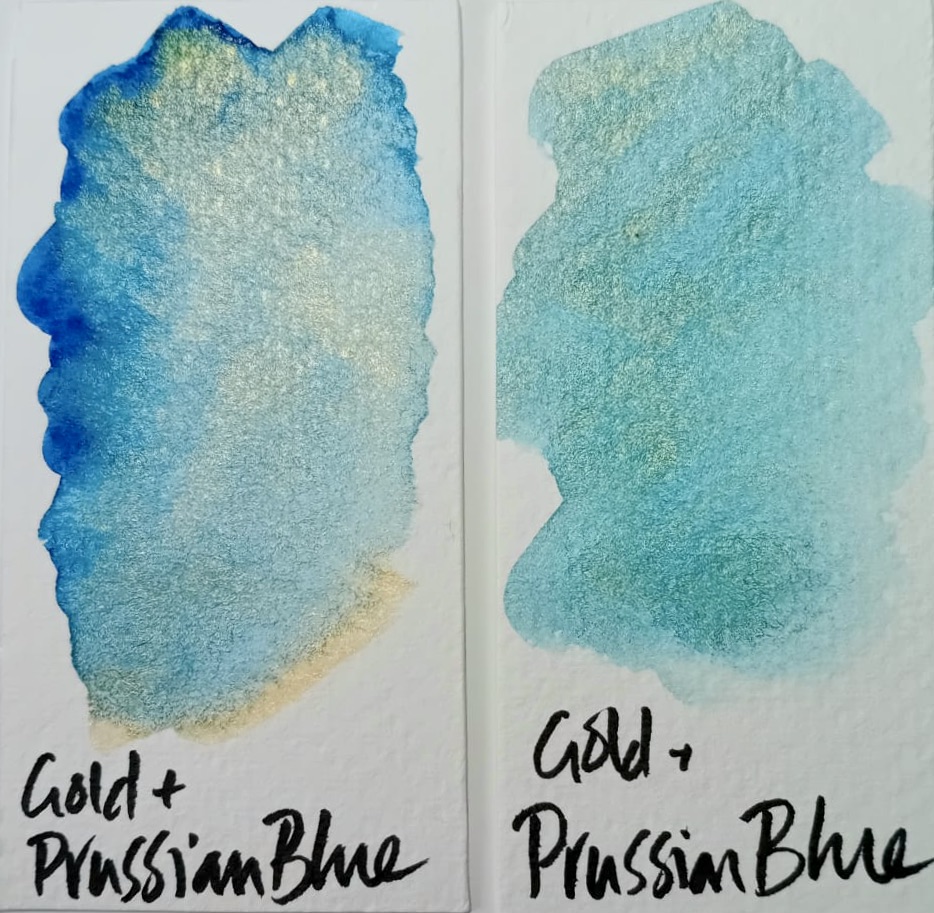 Two painted swatches alongside each other. One shows the prussian blue popping through the gold shimmer. The other swatch shows a more evenly distributed mix of th eblue and gold.